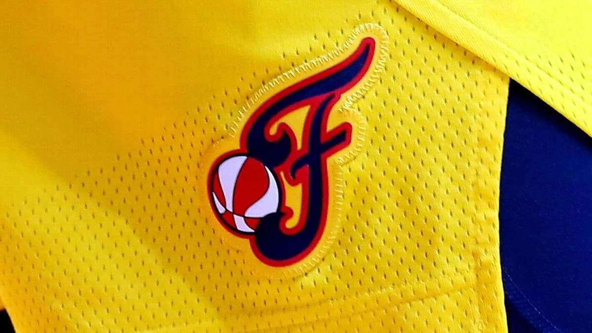 2 fans escorted from seats in Aces' win at Fever