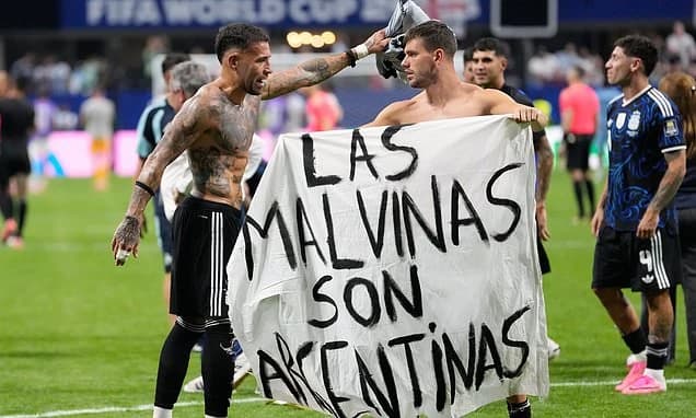 Argentina stars face nervous wait over potential ban for holding up 'Malvinas' banner after win over