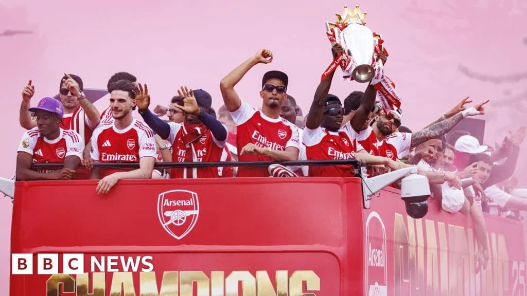 Arsenal fans line London streets in Premier League victory parade