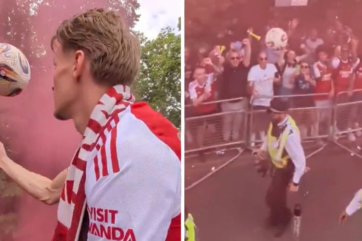 Arsenal’s Martin Ødegaard accidentally hits police officer on head with football during parade