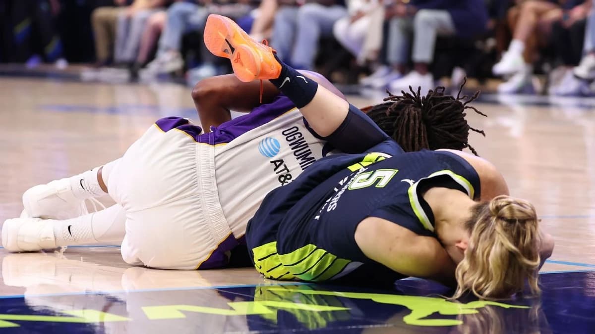 Bueckers nets 25, exits Wings' win after collision...