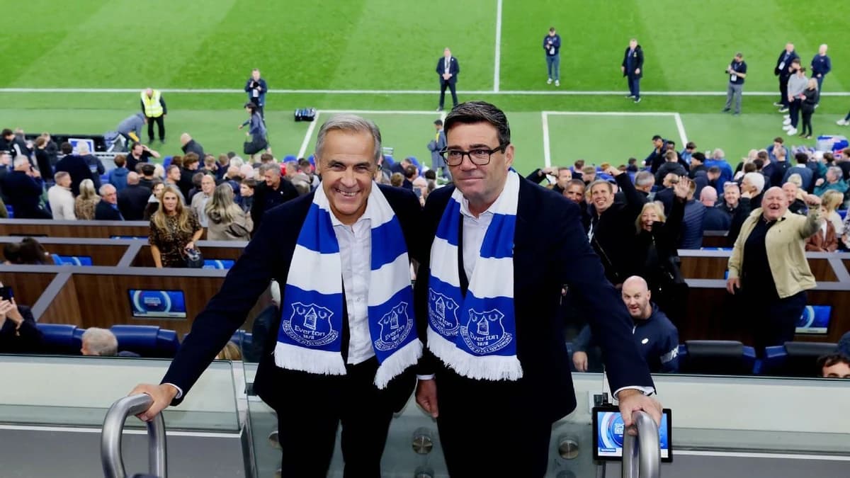 Burnham watches Everton with Canadian PM