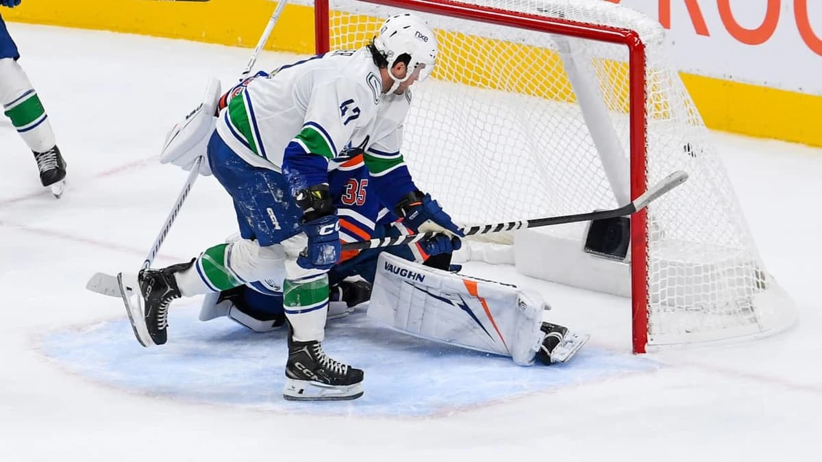 Canucks recover for OT victory against Oilers after blowing three-goal lead