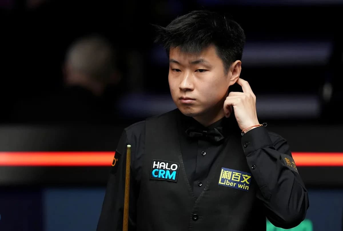 China's Zhao Xintong loses in quarterfinals of world snooker champs to end title defense