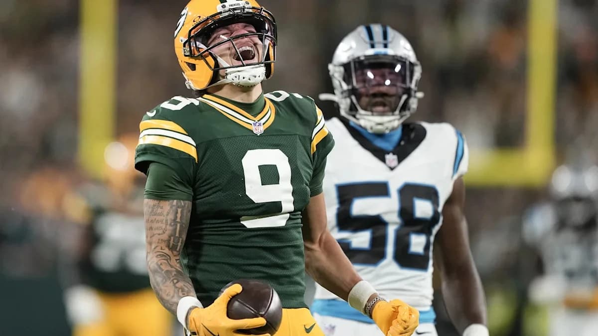 Christian Watson exits early against Panthers