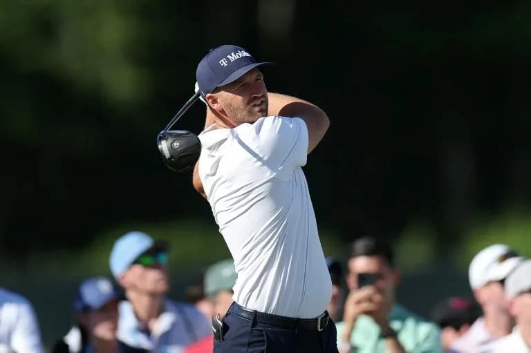 Clark clings to US Open lead as Scheffler charges