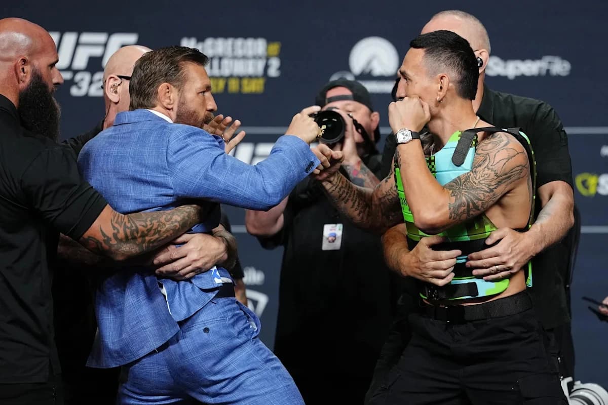 Conor McGregor slams Max Holloway’s glasses to ground in intense UFC 329 staredown