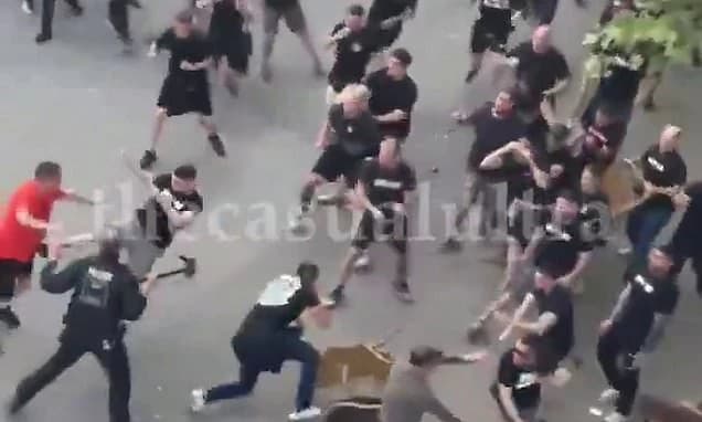 Crystal Palace fans clash with rival supporters in violent scenes as riot police step in ahead of Co