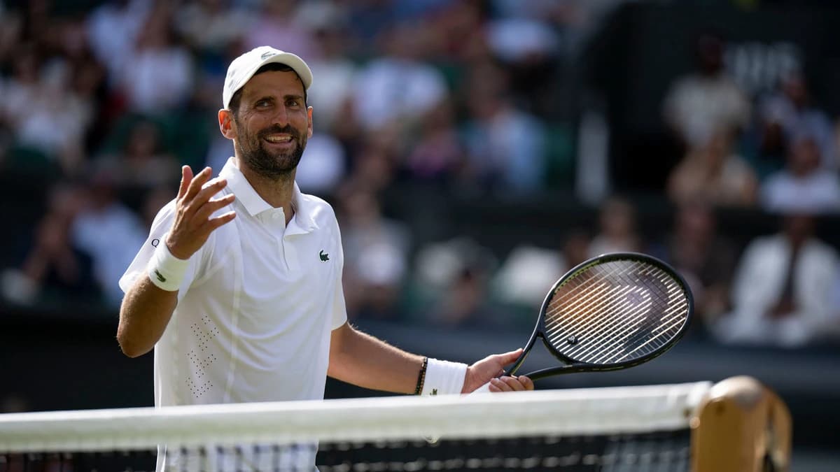 Djokovic reaches quarter-finals with landmark win