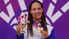 Evans steps out of shadows into spotlight with Scotland's fourth gold