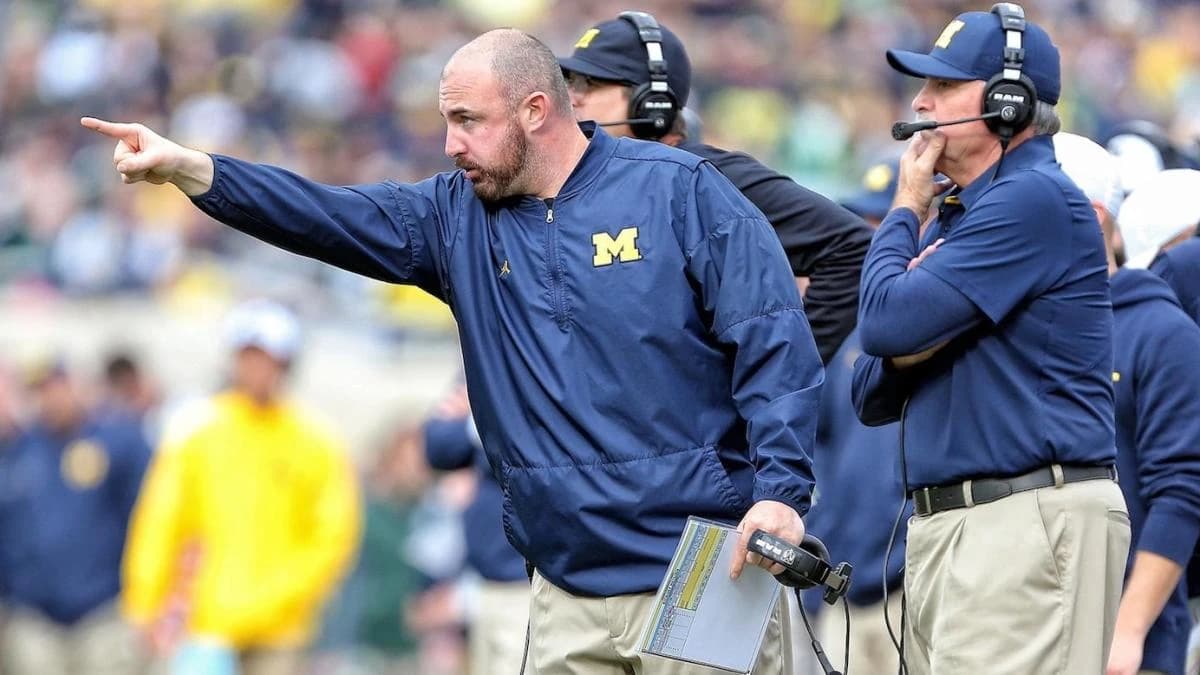 Ex-Michigan coach's lawsuit alleges school leaders covered up sign-stealing scheme ahead of 2023 tit