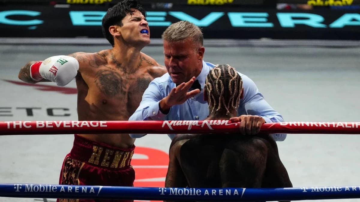 Garcia backs up talk, TKO's Benn in second round to retain WBC title