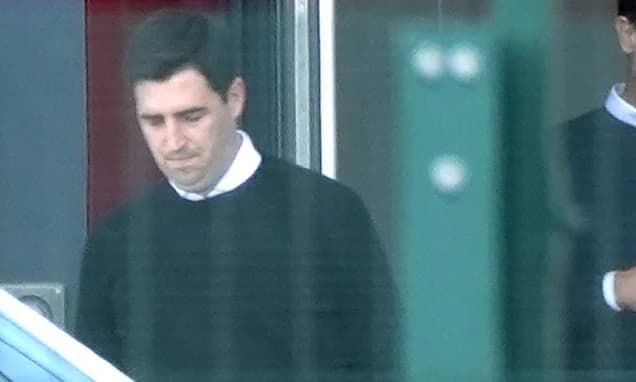 Grinning Andoni Iraola leaves Liverpool's training ground after finalising two-year deal to replace
