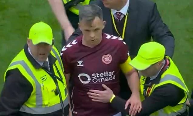Hearts condemn ugly scenes that saw Celtic fans ATTACK their players: Scottish club call for 'the st