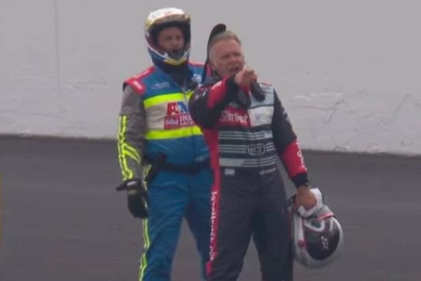 Indy 500 star stands on track after huge crash to yell 'f*** you' at rival in wild scenes