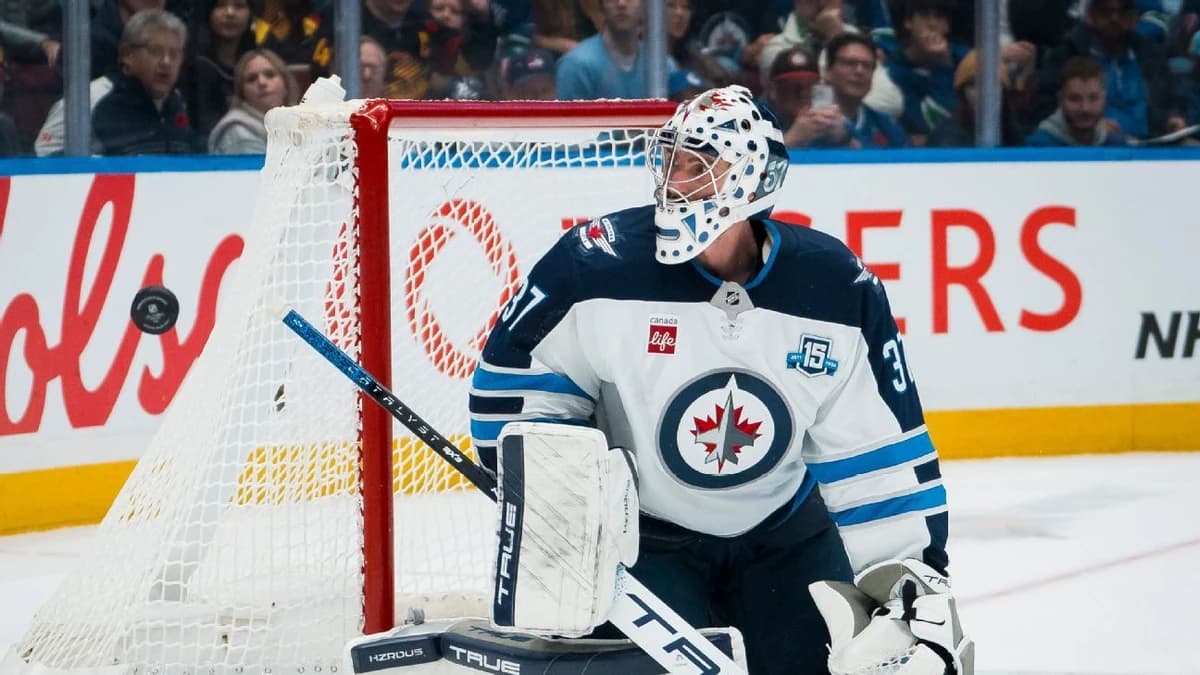Jets suspend star goalie Hellebuyck after training camp no-show