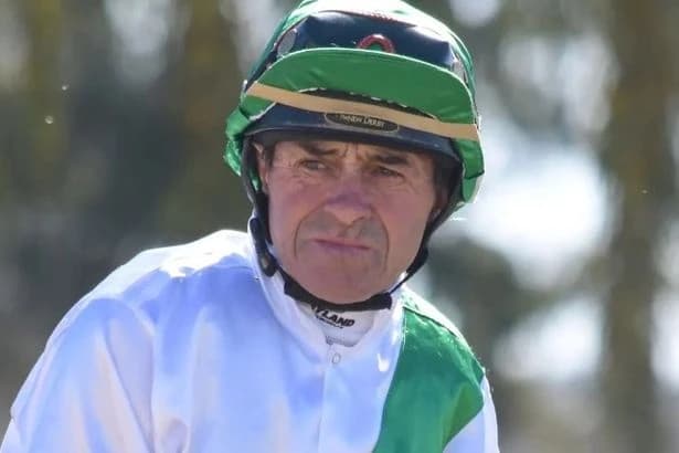 Jockey, 67, has legs amputated after being trapped under dead horse for six hours