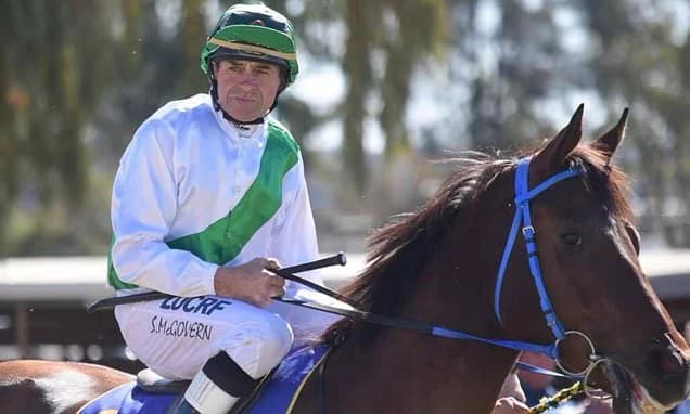 Jockey has both legs amputated after being trapped underneath a dead horse for SIX hours