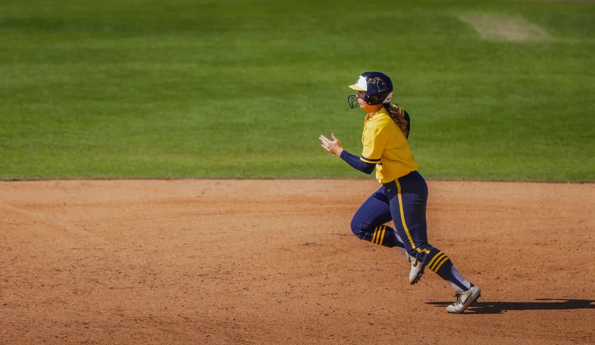 Kansas walks off Michigan in extra innings of NCAA regional, 1-0, putting the Wolverines one loss fr