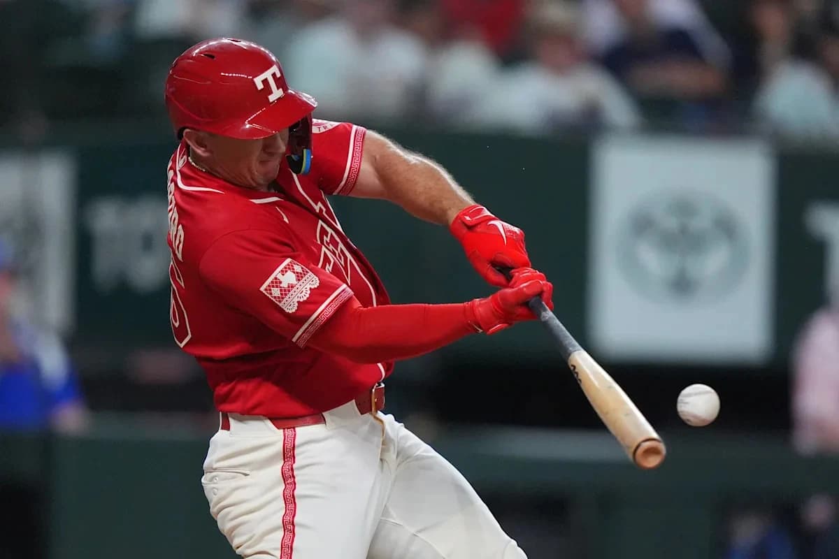 Langford and Burger homer in a four-run eighth as the Rangers beat the Astros 7-3