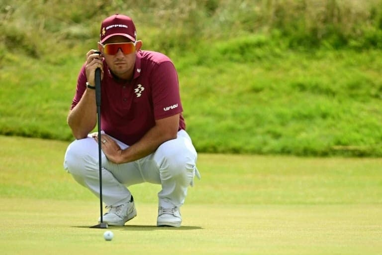 Leader Herbert, Burns equal record 62 at British Open, DeChambeau docked two shots