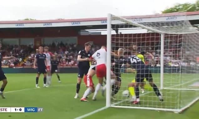 League One's 'ghost goal'?: Fans claim Stevenage's 92-minute winner to send them to the play-offs di