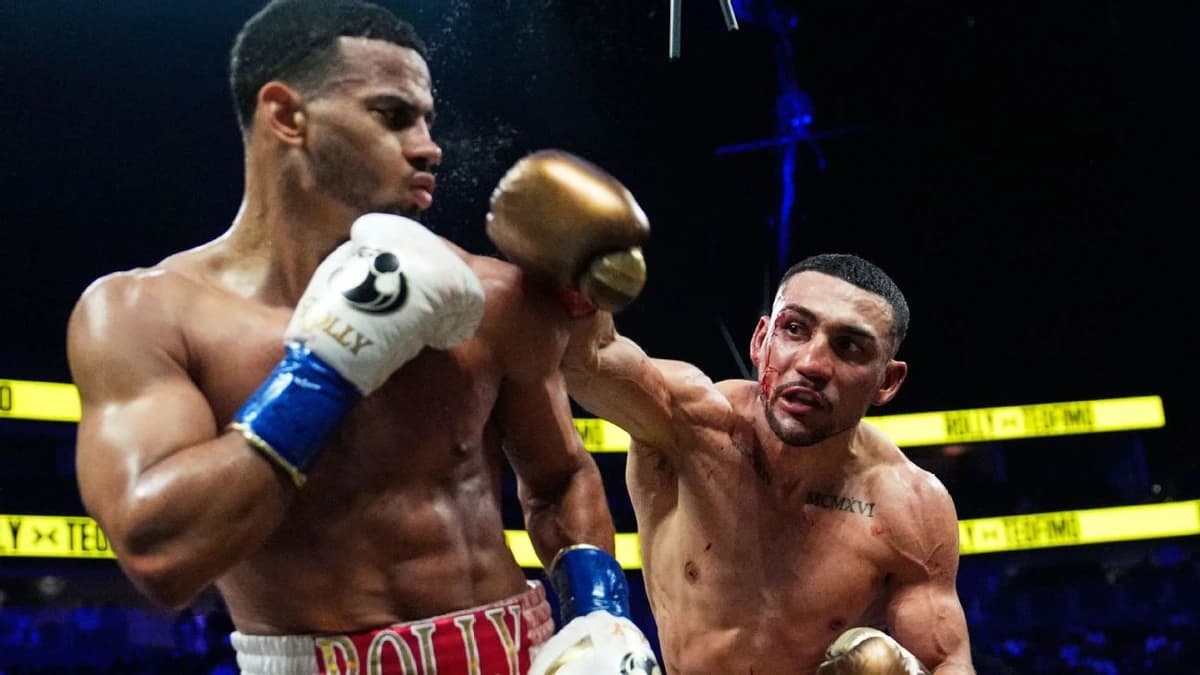 Lopez wrests Romero's WBA title by decision, now 3-weight champ