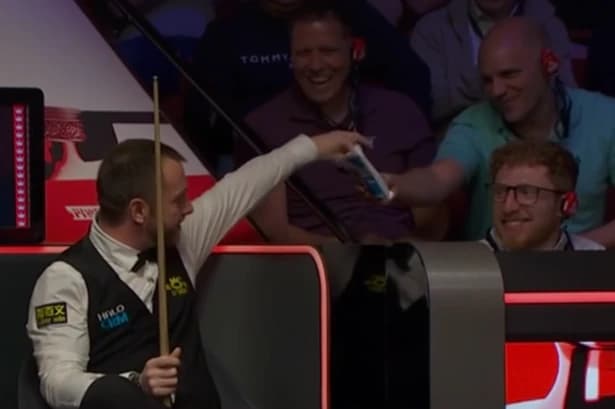 Mark Allen takes sweets from Crucible crowd after century break vs Kyren Wilson