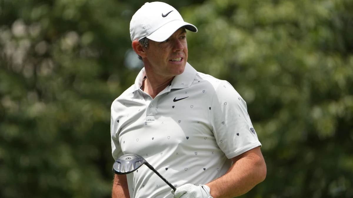 Memorial Tournament: Rory McIlroy and Scottie Scheffler sneak under par before play suspended due to