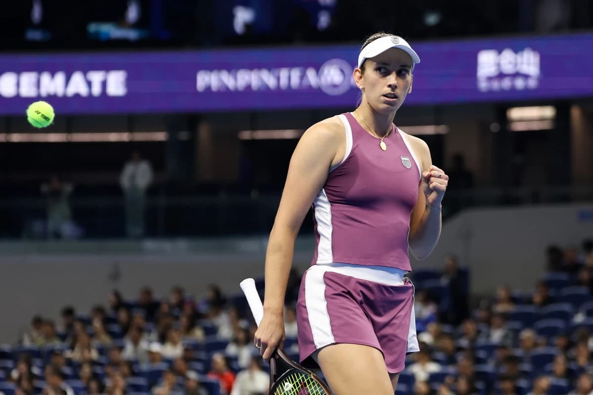 Mertens' giant-killing run continues with Swiatek upset in Beijing quarterfinals
