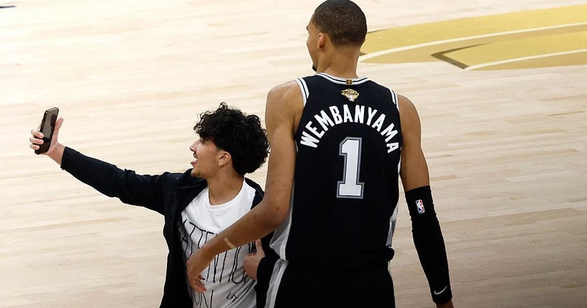 NBA bans 2 fans for life after man rushes court during Finals Game 1
