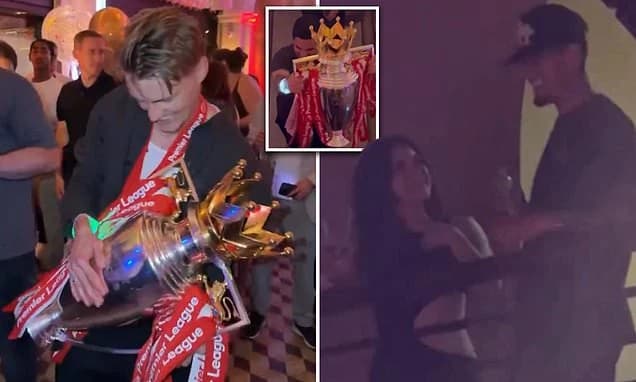 New footage of Arsenal's lavish Mayfair celebrations emerges as Martin Odegaard dances with trophy a