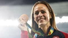 Olympic medallist Simpson collapses at mile event