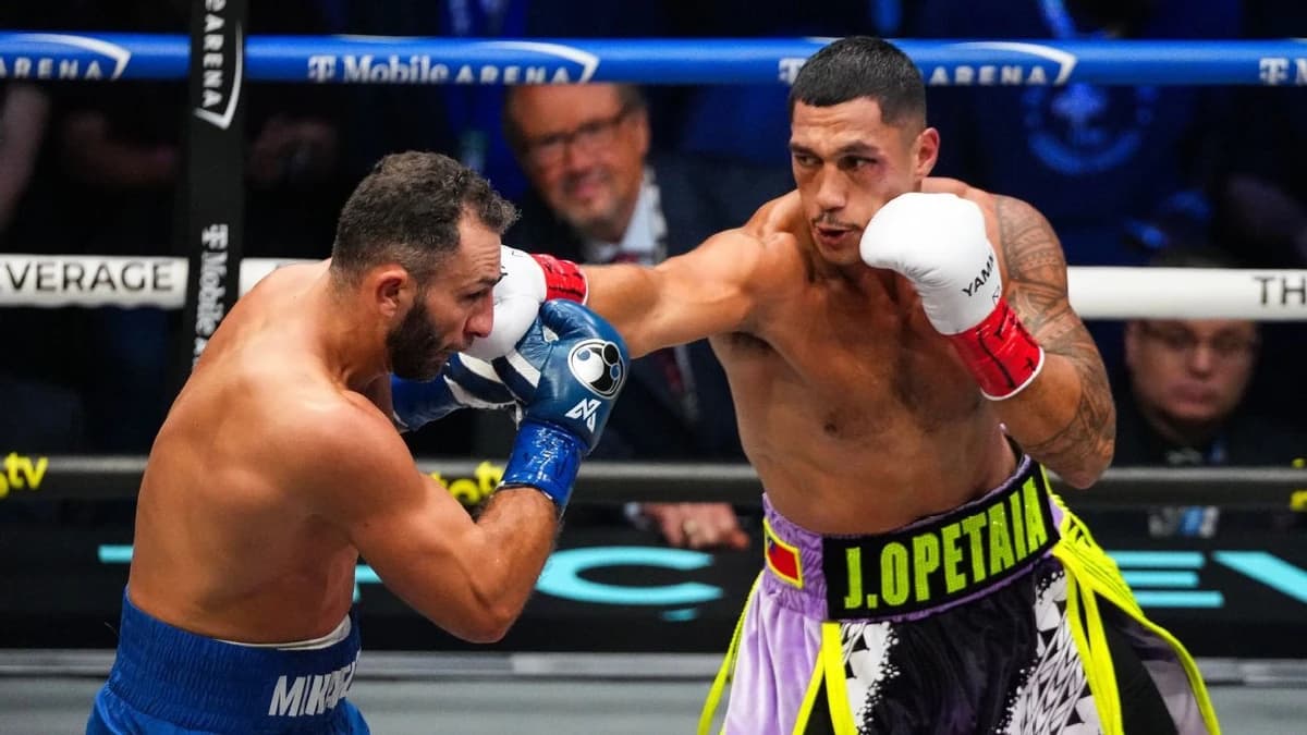 Opetaia rocks Mikaelian by 9th-round TKO, faces off in ring with Benavidez