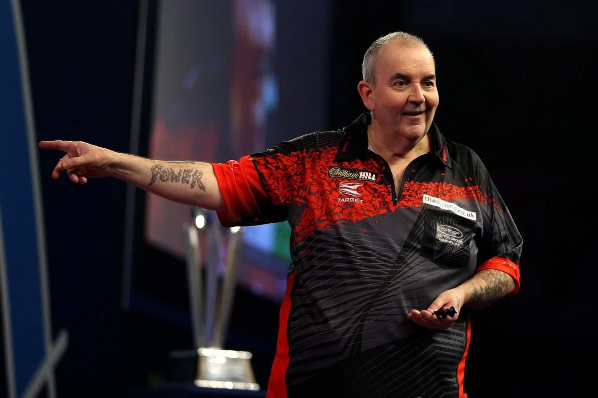 Phil Taylor ends eight-year retirement as he announces shock darts return