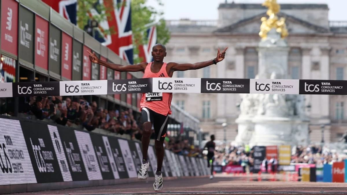 Sawe first to finish marathon in under 2 hours