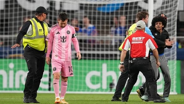 Security shields Lionel Messi from fan during FC Cincinnati-Miami game