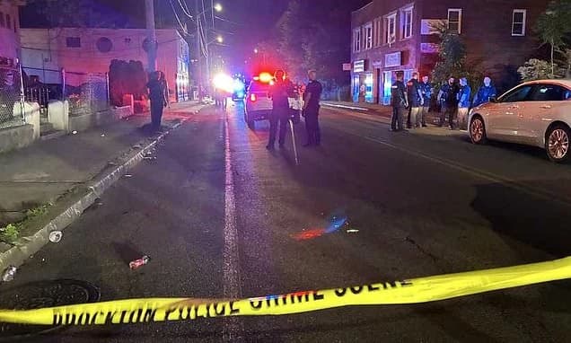Three gunshots, a stolen moped and blood pouring onto the streets where World Cup fans were partying
