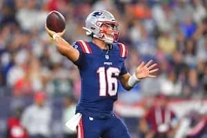 Tommy DeVito throws TD pass, Ja’Quinden Jackson taken off in ambulance as Patriots beat Eagles 24-21