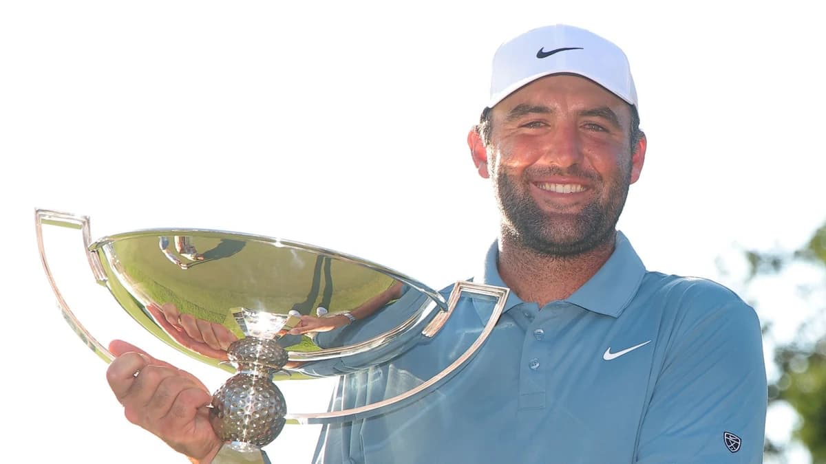 Tour Championship: Scottie Scheffler holds off Viktor Hovland to claim FedExCup title and break more