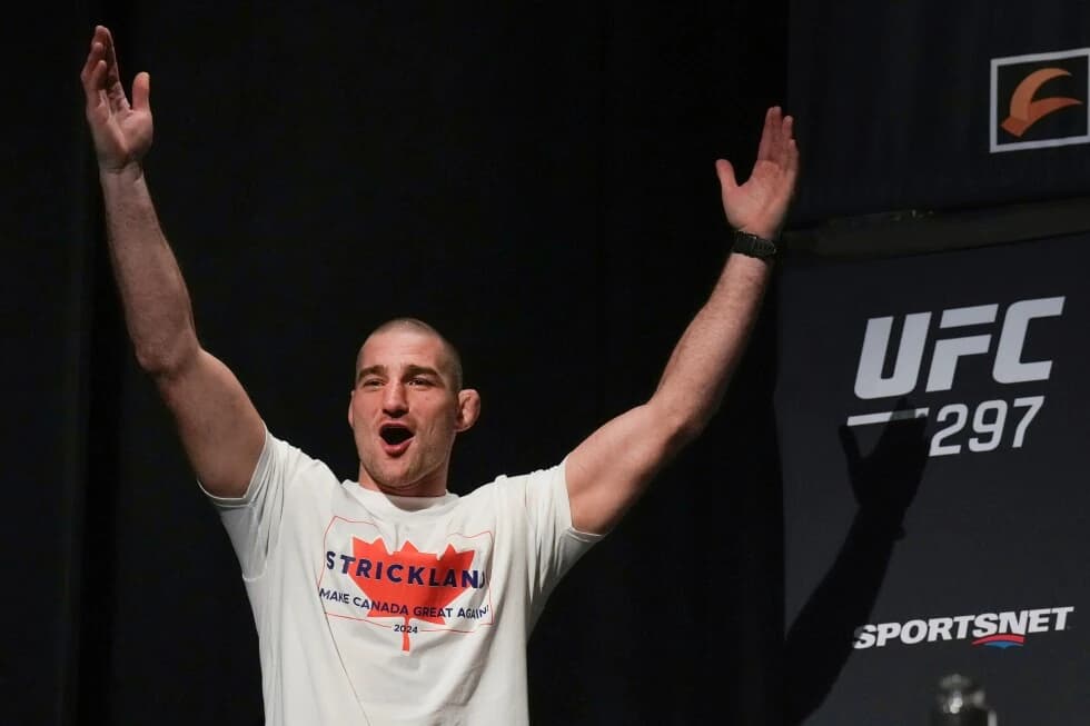 UFC 328 goes on without Trump, Van defends 125-pound crown, Strickland wins middleweight title