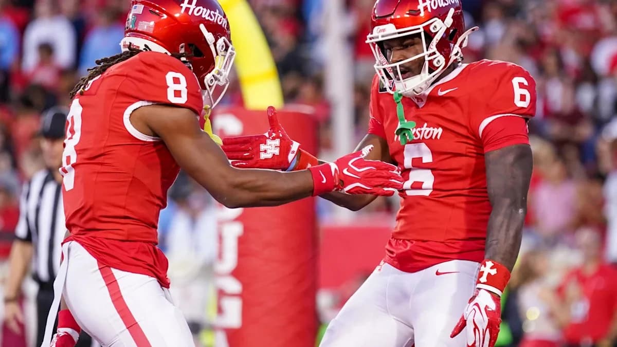Weigman throws 5 TD passes to lead No. 20 Houston to a 35-32 win over No. 18 Oklahoma State