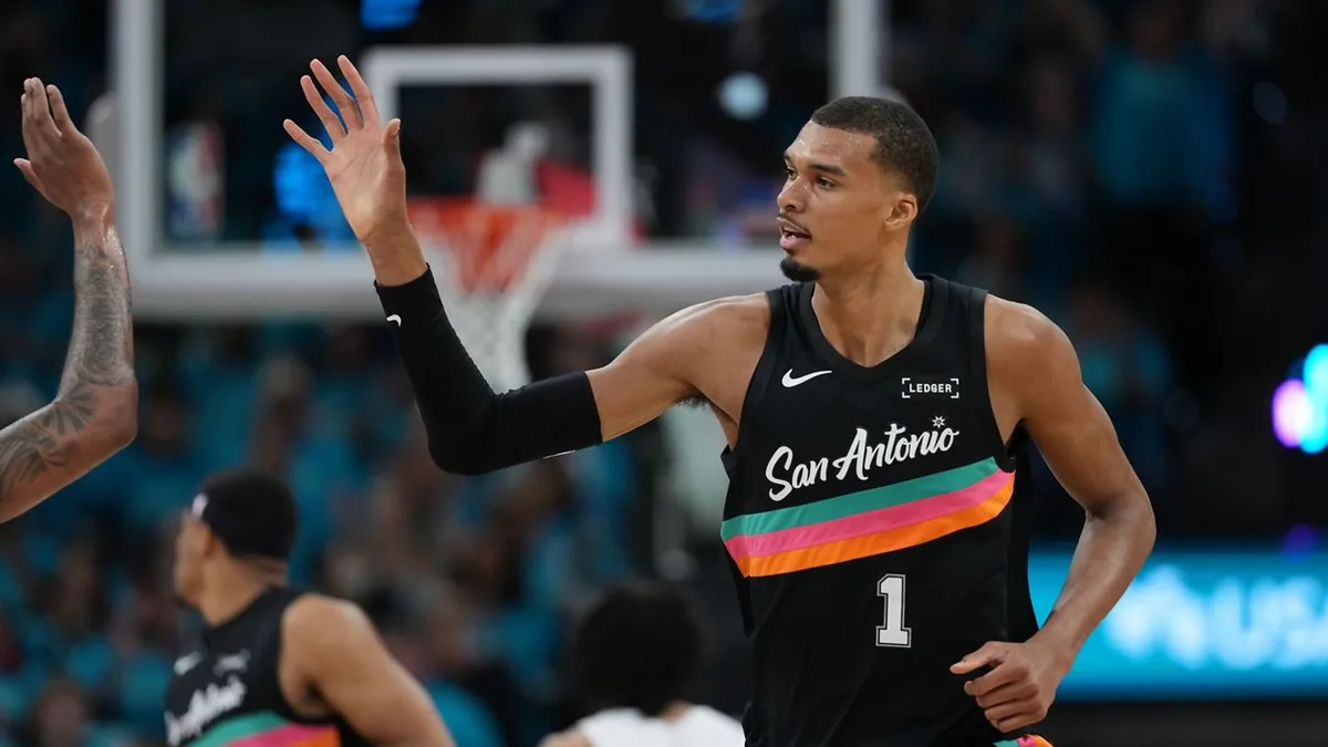 Wembanyama scores 35 points in playoff debut as Spurs roll past Trail Blazers 111-98