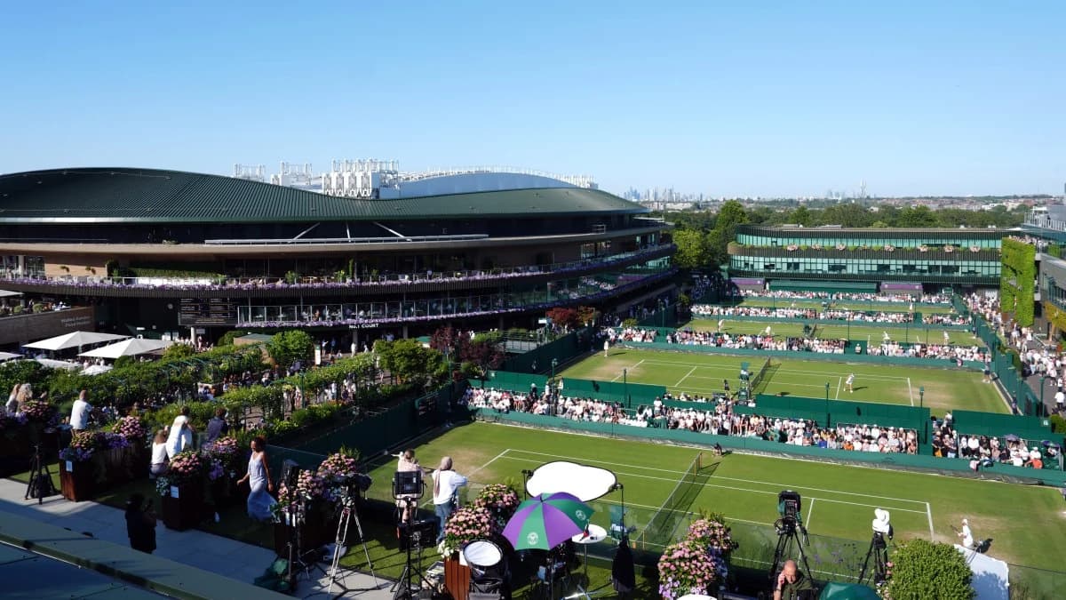 Wimbledon rides a rain-free fortnight to record-high attendance