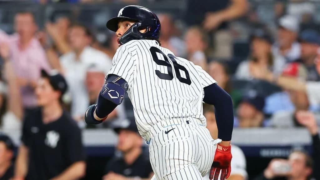 Yanks' Lombard homers in debut, joining brother