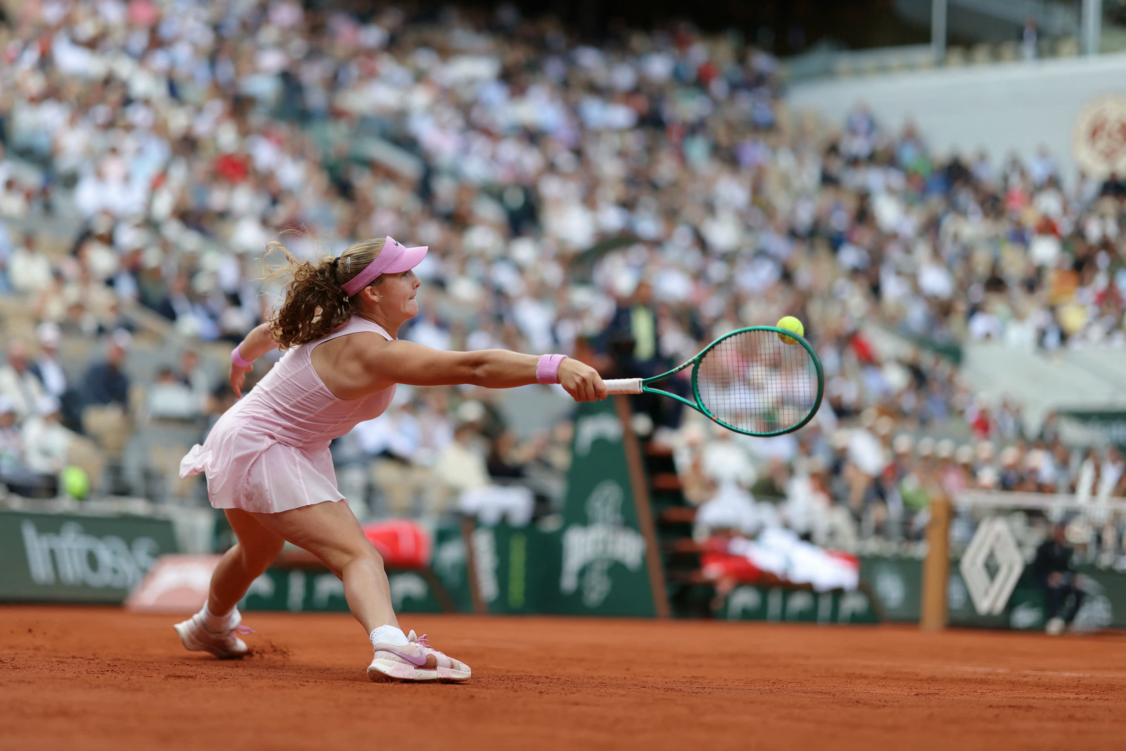 Andreeva snaps Kostyuk's winning streak to reach first major final