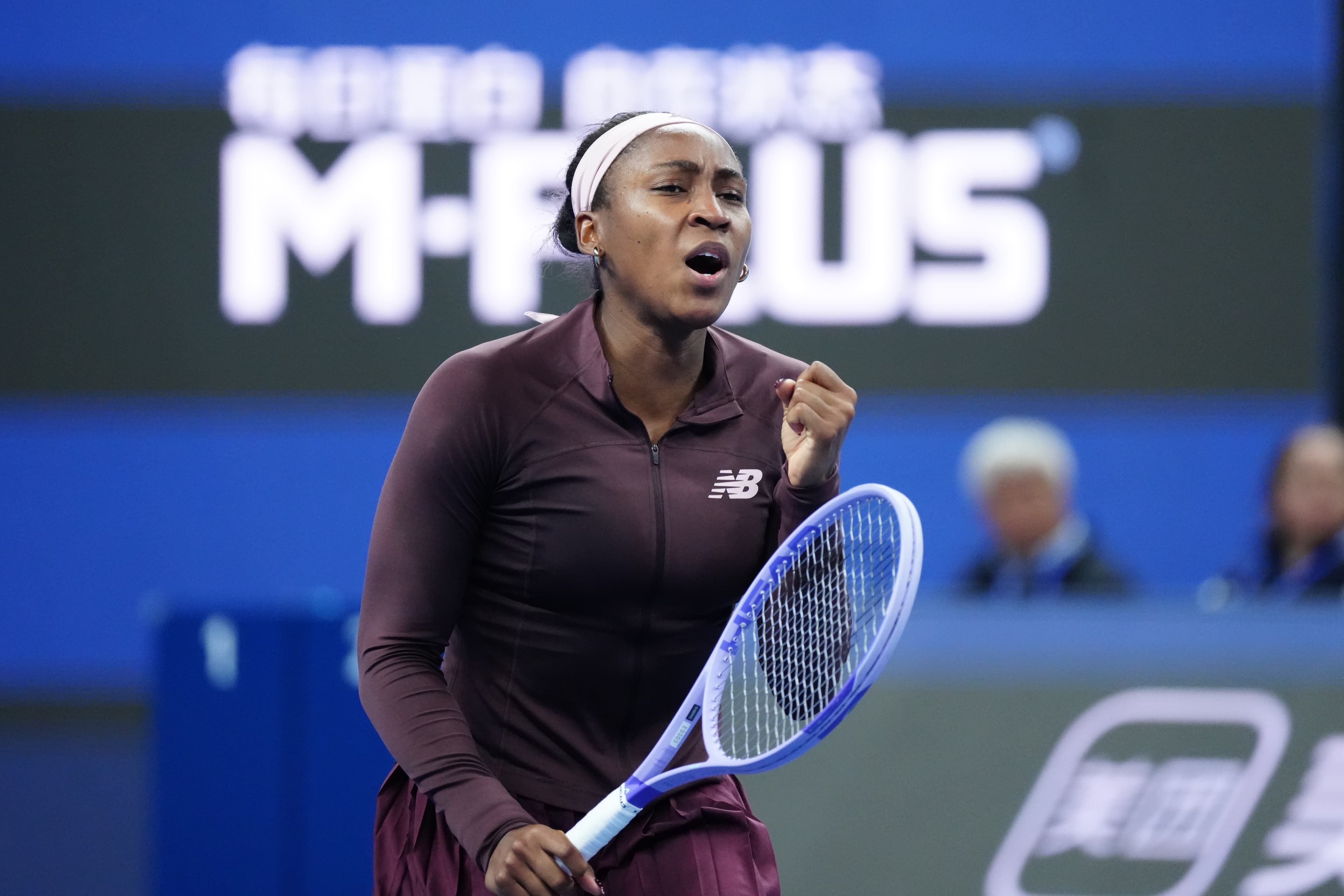 Gauff pulls away late to defeat rising Sun in Beijing